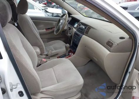 2004 Toyota Corolla Le z USA, uszkodzony, nr VIN 2T1BR32E14C267457